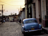 Cobbled Street at Sunset with Old American Car, Trinidad, Sancti Spiritus Province, Cuba Photographic Print by Lee Frost