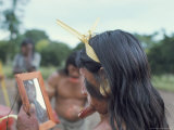 Suya Indian Admiring Lip Disk in Mirror, Brazil, South America Photographic Print by Robin Hanbury-tenison