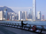 Morning Exercise, Victoria Harbour and Hong Kong Island Skyline, Hong Kong, China Photographic Print by Amanda Hall