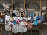 Large Quantity of Laundry Hanging from the Balcony of a Crumbling Building, Habana Vieja, Cuba Photographic Print by Eitan Simanor Large Quantity of Laundry Hanging from the Balcony of a Crumbling Building, Habana Vieja, Cuba Photographic Print by Eitan Simanor