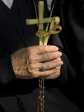 A Nun's Hands Holding Two Crosses Made of Palm Leaves, St. Anne Church, Israel Photographic Print by Eitan Simanor