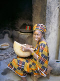 Woman Sitting in Courtyard, Djenne, Mali, Africa Photographic Print by Bruno Morandi