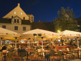 Al Fresco Dining at Night in Square of Traditional Buildings, Old Town, Latvia Photographic Print by Christian Kober