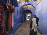 Man Walking Through Pastel Coloured Streets of Chefchaouen, Morocco, North Africa, Africa Photographic Print by Christian Kober