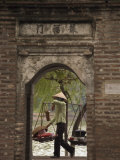 Lady Carrying Baskets, Hoan Kiem Lake, Hanoi, Northern Vietnam, Southeast Asia Photographic Print by Christian Kober