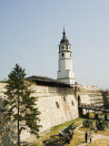 Clock Tower and Modern Military Cannon in the Grounds of the Kalemegdan Citadel, Belgrade, Serbia Photographic Print by Christian Kober