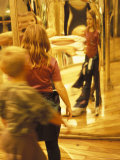 Children Standing in Front of Distorting Mirrors, Petrin Gardens, Czech Republic Photographic Print by Richard Nebesky