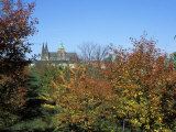 View of Trees in Autumn Colours on Petrin Hill Gardens with Prague Castle in the Distance, Prague Photographic Print by Richard Nebesky