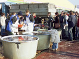Buying Live Carp from Tubs on the Street for Christmas Eve, Prague Photographic Print by Richard Nebesky