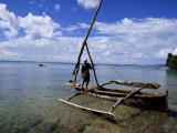 Fisherman on a Boat, Zanzibar, Tanzania, East Africa, Africa Photographic Print by Yadid Levy