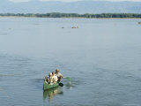 Canoeing, Mana Pools National Park, Unesco World Heritage Site, Zimbabwe, Africa Photographic Print by Sergio Pitamitz