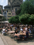 People Sitting at an Outdoors Restaurant Near St. Martin Church Photographic Print by Yadid Levy People Sitting at an Outdoors Restaurant Near St. Martin Church Photographic Print by Yadid Levy