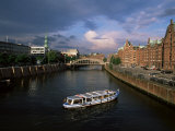Excursion Boat on Canal in the Speicherstadt, the Historical Warehouse City Area, Hamburg, Germany Photographic Print by Yadid Levy