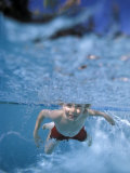 Little Boy Swimming Underwater Photographic Print by James Gritz