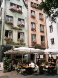 People Sitting at an Outdoor Restaurant by the Fish Market in the Old Town, North Rhine Westphalia Photographic Print by Yadid Levy