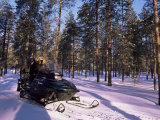 Woman Driving Snowmobile Near Lulea, Lapland, Sweden, Scandinavia Impressão fotográfica por Sergio Pitamitz