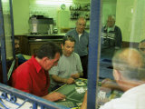 Men Playing Cards, Corte, Corsica, France Photographie par Yadid Levy