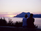 Couple Watching Sunset Near Porto, Corsica, France, Mediterranean Photographie par Yadid Levy