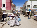 Women Walking Down Street, Copacabana, Laketiticaca, Bolivia, South America Photographic Print by Marco Simoni
