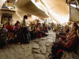 Pilgrims Spin Prayer Wheels Outside a Monastery in the Bharkor, Lhasa, Tibet, China Photographic Print by Don Smith