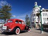 Old Red Car Advertising Tours in the Art Deco City, Napier, New Zealand Photographic Print by Don Smith