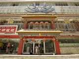 Modern Shops Line the Yutok Lam a Street Connecting the Jokhang Temple to the Potala Square Photographic Print by Don Smith