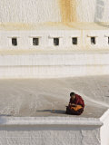 Tibetan Buddhist Monk Reading Scriptures at the Boudha Stupa at Bodhanath, Kathmandu, Nepal Photographic Print by Don Smith