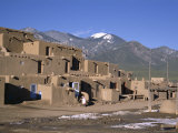 Lady Sweeps up after Visitors Have Departed, Taos Pueblo, Taos Photographic Print by Nedra Westwater Lady Sweeps up after Visitors Have Departed, Taos Pueblo, Taos Photographic Print by Nedra Westwater