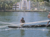 Fisherman Casting His Throw Net in the Coastal Backwaters, Kerala, India Photographic Print by Tony Waltham