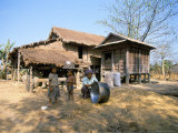 Woman Cleaning Pot Outside Her House, Near Siem Reap, Cambodia, Indochina, Southeast Asia Photographic Print by Jane Sweeney