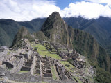 Classic View from Funerary Rock of Inca Town Site, Machu Picchu, Unesco World Heritage Site, Peru Photographic Print by Tony Waltham