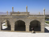 Man Reading the Koran Whilst Walking Round the White Marble Mosque Built by Shah Jahan, Kabul Photographic Print by Jane Sweeney