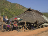 Thatched House and Clothes Drying, Ann Village, Kengtung (Kyaing Tong), Shan State, Myanmar (Burma) Photographic Print by Jane Sweeney