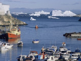 Fishing Boat Returns to Harbour from Disko Bay, with Icebergs, Ilulissat (Jacobshavn), Greenland Photographic Print by Tony Waltham