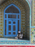 Pilgrim Sits in a Niche at the Shrine of Hazrat Ali, Mazar-I-Sharif, Afghanistan Photographic Print by Jane Sweeney