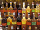 Bottles of Local Rum Drinks at Le Diamant Village, Martinique, West Indies, Caribbean Photographic Print by Guy Thouvenin