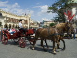 Horse and Carriages in Main Market Square, Old Town District, Krakow, Poland Photographic Print by R H Productions 
