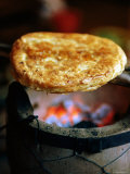 Lijiang Baba Cooking on Coals, Lijiang, Yunnan, China Photographic Print by Greg Elms