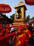 Men in Traditional Costume Carrying Phra Bang Buddha Image, Luang Prabang, Laos Photographic Print by Alain Evrard