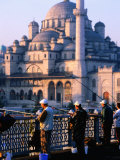 Fishermen on Galata Bridge with Mosque in Background, Istanbul, Turkey Photographic Print by John Elk III