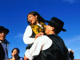 Man Lifting Up His Daughter at Festa de Santo Antonio, Lisbon, Portugal Photographic Print by Alain Evrard