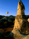 Tufa Formation with Hot-Air Balloon in the Background, Cappadocia, Nevsehir, Turkey Photographic Print by John Elk III