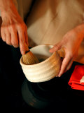 Woman Whisking Tea for Ceremony at Okura Hotel, Tokyo, Kanto, Japan Photographic Print by Greg Elms