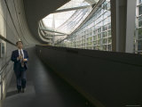 Man Walking Outside the Tokyo International Forum, Tokyo, Kanto, Japan Photographic Print by Brent Winebrenner