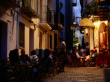 Outdoor Restaurants Near Citadel at Night, Peniscola, Valencia, Spain Photographic Print by David Tomlinson