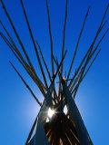 Sun Shining through Top of Teepee Photographic Print by Holger Leue
