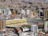 Estado Hernando Siles Surrounded by High-Rise Buildings, La Paz, Bolivia Photographic Print by Brent Winebrenner