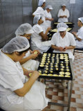 Kitchen Workers Making Portuguese Tarts at Antiga Confeitaria de Belem, Lisbon, Portugal Photographic Print by Greg Elms