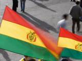 Bolivian Flags Flying Outside El Estado Hernando Siles, La Paz Photographic Print by Brent Winebrenner