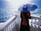 Woman with an Umbrella on a Balcony Photographic Print by Philip & Karen Smith
